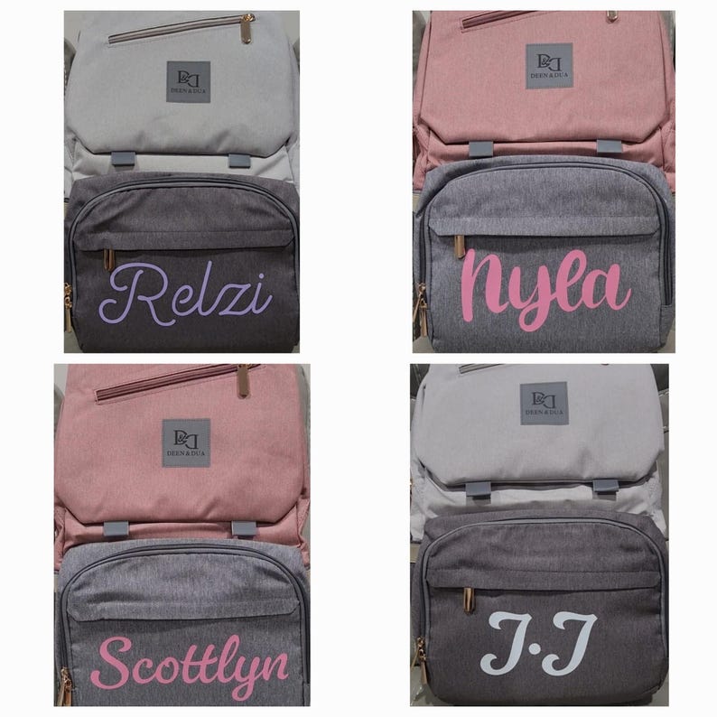May include: Four gray and pink diaper bags with personalized names. The names are "Relzi", "Nyla", "Scottlyn", and "J.J".