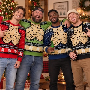 May include: Four long-sleeved knit sweaters featuring a large, beige, textured graphic on the chest. The sweaters come in red, green, blue, and black, each decorated with white snowflake patterns and geometric borders along the hem and sleeves.