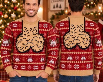 Peut inclure: Un pull à manches longues en tricot rouge et beige avec un motif répétitif de cloches et de flocons de neige blancs. Le centre de la poitrine présente un grand motif texturé beige, souligné de noir, sur un panneau rectangulaire beige.