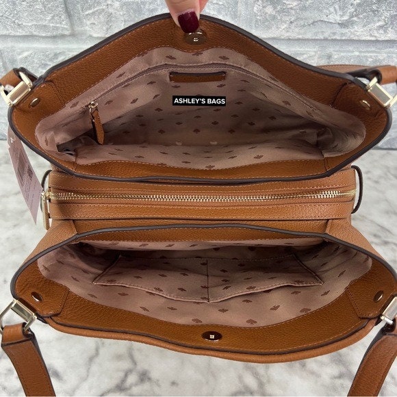 Buy Kate Spade Textured Zip Closure Crossbody Bag In Brown | 6thStreet UAE