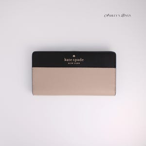 Cartera plegable grande y delgada Staci de Kate Spade en beis cálido