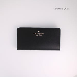 Cartera plegable grande y delgada en negro Staci de Kate Spade