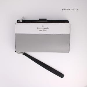Cartera para teléfono con diseño color block Staci de Kate Spade en gris Nimbus