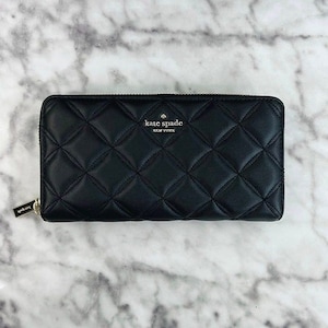 Cartera continental grande de cuero liso acolchado Natalia de Kate Spade