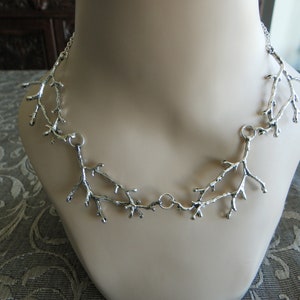 Silver branch or twig necklace