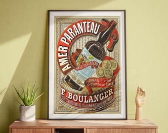 May include: Framed vintage advertisement for "Amer Paranteau" featuring a bottle illustration with red and gold accents. The poster includes text in French, with the brand name prominently displayed in a circular design. The poster is framed in black.