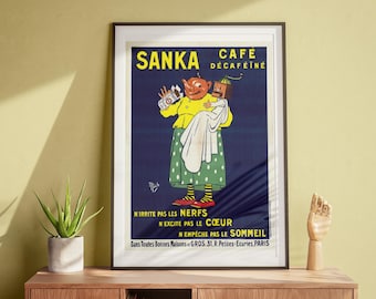 May include: A vintage advertisement for Sanka decaffeinated coffee featuring a cartoon woman holding a baby. The text reads "Sanka Cafe Decaffeine" and "N'irrite pas les nerfs N'excite pas le coeur N'empeche pas le sommeil Dans Toutes Bonnes Maisons et GROS. 31. R. Petites-Ecuries. PARIS".