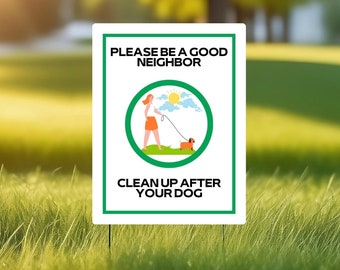 May include: White sign with a green border and text that reads "Please be a good neighbour. Clean up after your dog."  A green circle with a cartoon illustration of a person walking a dog on a leash.
