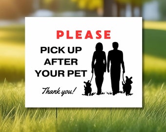 May include: White sign with black text and silhouettes. The sign reads "PLEASE PICK UP AFTER YOUR PET Thank you!" and shows a couple walking two dogs.