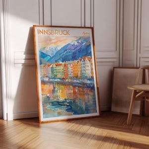 a picture of a painting on a wall next to a chair