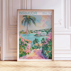 May include: A watercolour painting of a tropical island scene with palm trees, pink houses, and a turquoise ocean. The text "BERMUDA" and "Atlantic Ocean" is printed at the top of the painting.