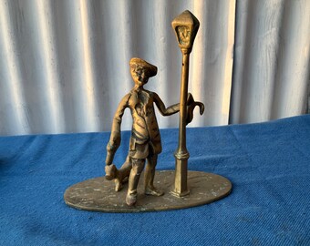 Vintage brass figure of man and his dog