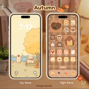 Peut inclure: Deux smartphones affichant une interface sur le thème de l'automne. L'écran de gauche présente un fond jaune clair avec des ours sur un banc, tandis que l'écran de droite arbore un fond à carreaux marron avec des icônes et widgets personnalisés.