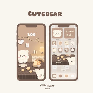 May include: A phone screen mockup with a brown and beige color scheme. The screen displays a clock with the time 1:00 and a cute cartoon bear. The phone screen also shows a grid of app icons with a bear theme. The text "Little Bear" and "Little Dainty Studio" are displayed on the screen.