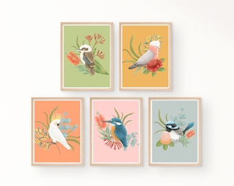 May include: Five framed prints featuring illustrations of Australian birds with floral accents. The prints are in a variety of colors, including green, yellow, orange, pink, and blue.