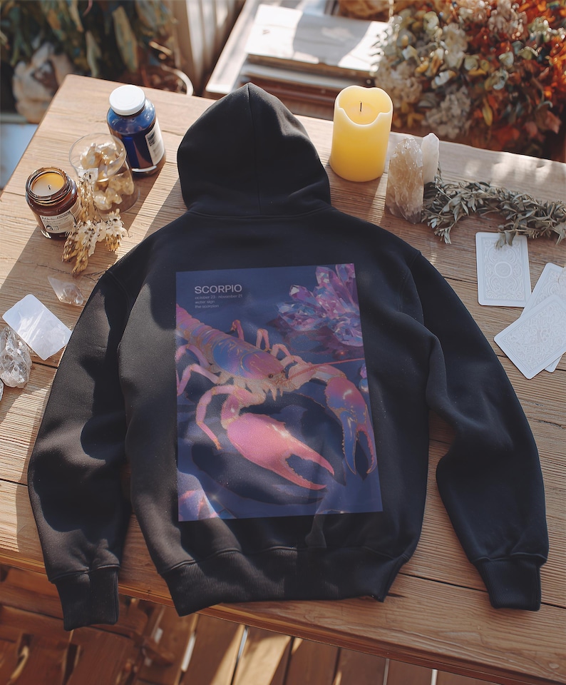 Black oversized custom hoodie with back print pink and blue Scorpio design and optional “Scorpio” text.