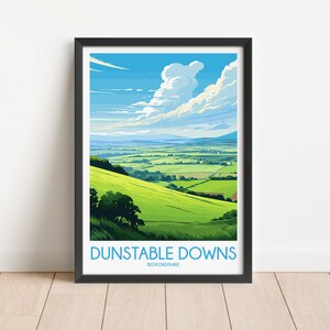 May include: A colorful illustration of a landscape with rolling green hills and a blue sky with white clouds. The text "Dunstable Downs, Bedfordshire" is at the bottom of the image.