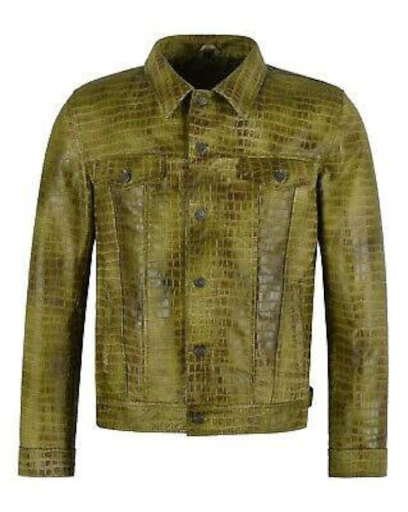 May include: A green leather jacket with a crocodile print. The jacket has a button-up front, two chest pockets, and two front pockets.