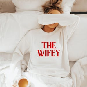 The wifey sweatshirt, it's giving wife shirt, trendy bride apparel, anniversary gift, minimalist aesthetic bride to be, honeymoon outfit