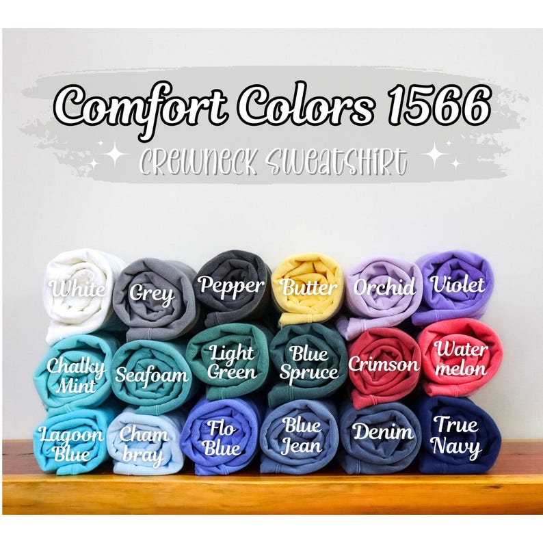 May include: Comfort Colors 1566 Crewneck Sweatshirt in a variety of colors, including white, grey, pepper, butter, orchid, violet, chalky mint, seafoam, light green, blue spruce, crimson, water melon, lagoon blue, cham bray, flo blue, blue jean, denim, and true navy.