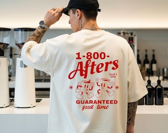 Puede incluir: Una camiseta de manga corta color hueso con un gráfico rojo en la espalda que dice 1-800-Afters, loud & late, y GUARANTEED good time, junto con dos tazas de café estilo caricatura con brazos y piernas.