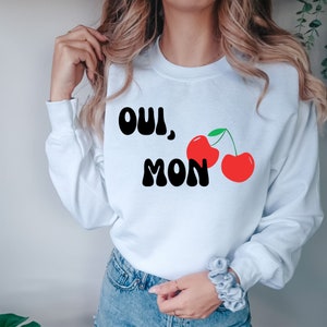 Oui Mon Cheri: Graphic print sweatshirt, Distressed denim & Mint