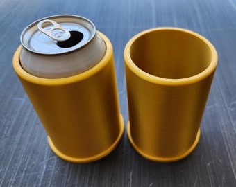 May include: Two gold-colored can coolers, one with a can inside. The can cooler is made of a smooth, textured material.
