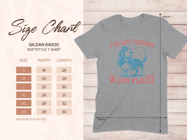 May include: Gray t-shirt with a blue and pink graphic of a basset hound with the text "I've got friends in low places". Size chart included with measurements in inches.
