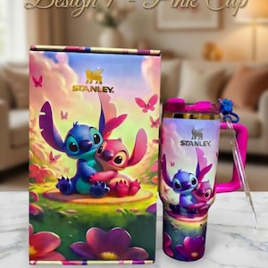 May include: A pink Stanley tumbler and matching box feature a colorful illustration of two cartoon characters. The tumbler has a pink handle and lid, and a clear straw. The box and tumbler have the text "Design 1 - Pink Cup" and "Crafty Custom".