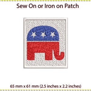 May include: Embroidered patch with a red elephant and a blue head with three white stars. The square patch has a white border and a textured background. The text "Sew On or Iron on Patch" is above the patch. The patch measures 65 mm x 61 mm (2.5 inches x 2.2 inches).