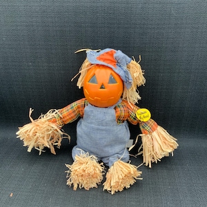 Ojo fantasmal de Gemmy, Espantapájaros de calabaza, Decoración de Halloween, Espantapájaros animado, Decoración de exteriores, Accesorio de Halloween