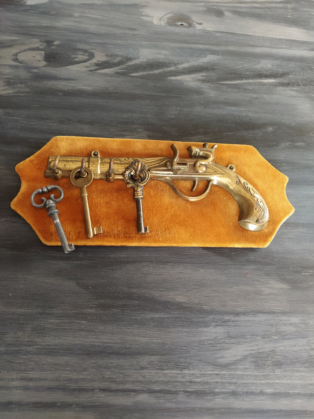 Old Style Key Rings Old Metal Key Ring Pistol 1960 on a Wooden Base, Covered in Velvet ...