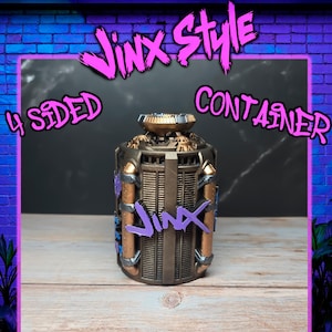 May include: A four-sided container with a metallic bronze finish, accented with gold and purple details. The word "Jinx" is prominently displayed in purple. The top has a detailed, ornate design. The text "Jinx Style Container" is above the container.