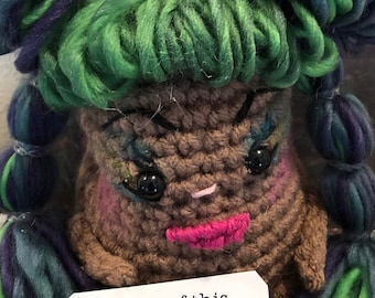 Snarky Spud Tempest T. Cup is a hand crocheted new humorous spin on the positive potato. She is a whirlwind of humor and sarcasm.