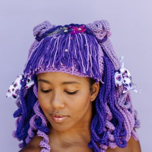 Animae curly crocheted wig perfect for transforming yourself into an amigurumi doll or animae character. She is a one of a kind fantasy.