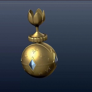 Puede incluir: Un tapón de botella decorativo dorado con una parte superior en forma de flor y una base redonda y estampada. La base tiene un diseño en forma de diamante y un patrón de estrellas.