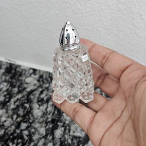 Vintage cut crystal glass salt shaker with silvertone lid