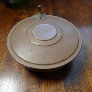 Vintage solid copper and brass accents pot with attached lid