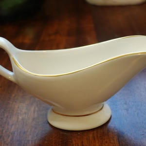 Beige and gold accents ceramic gravy boat