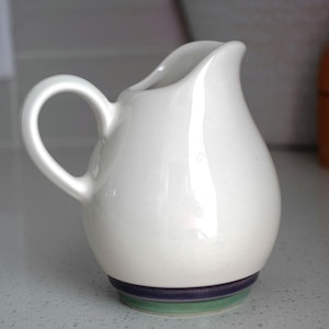 Small White Ceramic Pfaltzgraff Creamer Pitcher with Green and Blue Base