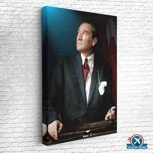 May include: A portrait of a man in a dark suit with a striped pattern, wearing a red tie and a white shirt. He is looking up and to the right, with a serious expression on his face. A red flag with a white crescent moon and star is visible in the background.