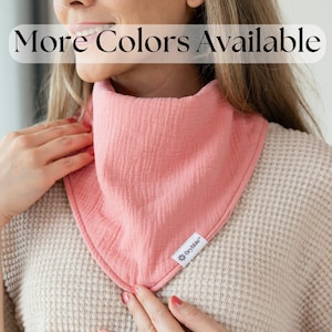 May include: A pink cotton bandana with a white logo that says "Drybbble" on it. More Colors Available.