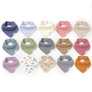 May include: A set of 15 baby bibs in various colors and patterns, including solid colors, rainbows, and polka dots. The bibs are made of soft, absorbent fabric and are perfect for keeping baby's clothes clean.