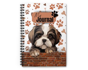 May include: Spiral-bound journal featuring a Shih Tzu puppy illustration. The cover has a white background with paw prints and bone graphics. The words "My Journal" are printed on a brown banner, with a paw print icon.