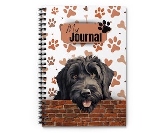 May include: Spiral-bound journal featuring a black dog peeking over a brick wall. The journal cover has a white background with paw prints, hearts, and bones. The words "My Journal" are printed on a brown banner, with a black paw print.