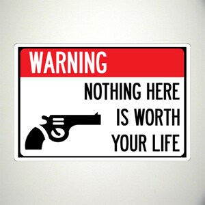 Nothing Here is Worth Your Life Metal Sign