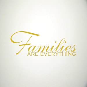 May include: Gold vinyl wall decal with the text "Families are everything".