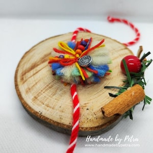 Handmade Bulgarian martenitsa with coin