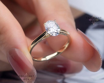Pierścionek zaręczynowy z owalnym Moissanite o masie 1,5 ct, cienki pasek, owalny pierścionek zaręczynowy, 14-karatowe złoto, prosty owalny pierścionek soliter, delikatny i wytworny pierścionek zaręczynowy dla niej