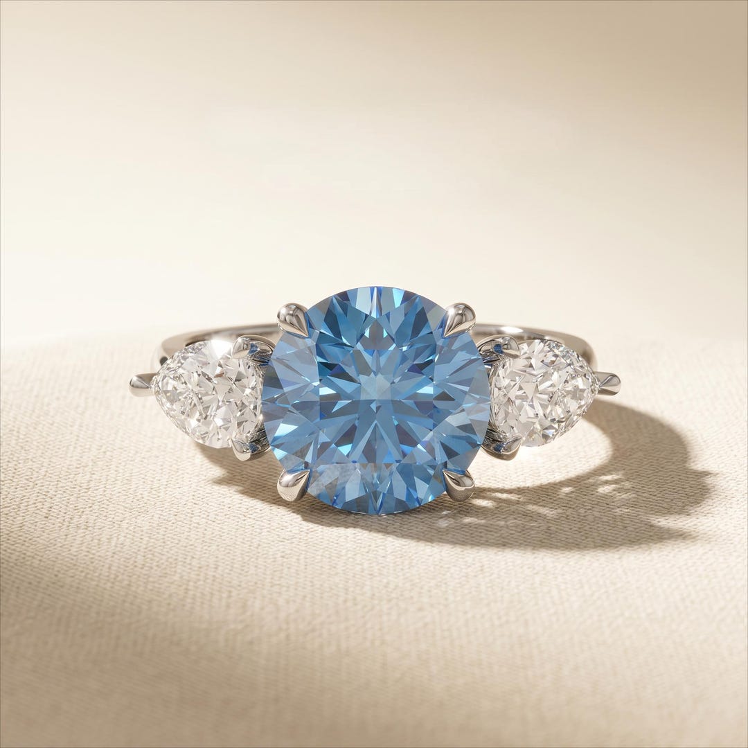3 Carat Fancy Vivid Blue Oval Lab Diamond Three Stone Engagement Ring ...